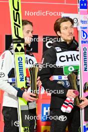23.02.2024, Oberstdorf, Germany (GER): Kristoffer Eriksen Sundal (NOR), Johann Andre Forfang (NOR), (l-r) - FIS world cup ski jumping men, super team HS235, Oberstdorf (GER). www.nordicfocus.com. © Reichert/NordicFocus. Every downloaded picture is fee-liable