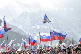 23.03.2024, Planica, Slovenia (SLO): feature: Slovenian flags, mountains on the background - FIS world cup ski flying men, team HS240, Planica (SLO). www.nordicfocus.com. © Reichert/NordicFocus. Every downloaded picture is fee-liable.