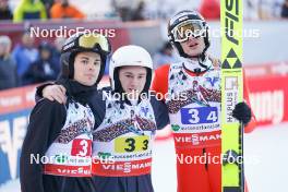 28.01.2024, Bad Mitterndorf, Germany (GER): Sandro Hauswirth (SUI), Remo Imhof (SUI), Gregor Deschwanden (SUI), (l-r)  - FIS world championships ski flying men, team HS235, Bad Mitterndorf (GER). www.nordicfocus.com. © Thibaut/NordicFocus. Every downloaded picture is fee-liable.