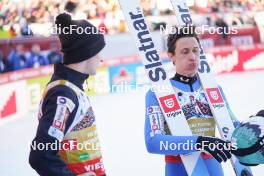 28.01.2024, Bad Mitterndorf, Germany (GER): Lovro Kos (SLO), Peter Prevc (SLO), (l-r)  - FIS world championships ski flying men, team HS235, Bad Mitterndorf (GER). www.nordicfocus.com. © Thibaut/NordicFocus. Every downloaded picture is fee-liable.