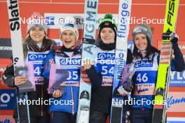 01.01.2024, Oberstdorf, Germany (GER): Abigail Strate (CAN), Eva Pinkelnig (AUT), Eirin Maria Kvandal (NOR), Jacqueline Seifriedsberger (AUT), (l-r) - FIS world cup ski jumping women, individual HS137, Oberstdorf (GER). www.nordicfocus.com. © Manzoni/NordicFocus. Every downloaded picture is fee-liable