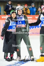 01.01.2024, Oberstdorf, Germany (GER): Thea Minyan Bjoerseth (NOR), Eirin Maria Kvandal (NOR), (l-r) - FIS world cup ski jumping women, individual HS137, Oberstdorf (GER). www.nordicfocus.com. © Manzoni/NordicFocus. Every downloaded picture is fee-liable