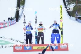 04.01.2024, Villach, Austria (AUT): Eva Pinkelnig (AUT), Nika Prevc (SLO), Nika Kriznar (SLO), (l-r) - FIS world cup ski jumping women, individual HS98, Villach (AUT). www.nordicfocus.com. © Barbieri/NordicFocus. Every downloaded picture is fee-liable.