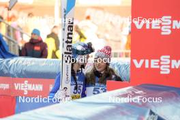 04.01.2024, Villach, Austria (AUT): Alexandria Loutitt (CAN), Abigail Strate (CAN), (l-r)  - FIS world cup ski jumping women, individual HS98, Villach (AUT). www.nordicfocus.com. © Barbieri/NordicFocus. Every downloaded picture is fee-liable.