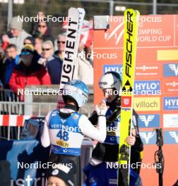 03.01.2024, Villach, Austria (AUT): Eva Pinkelnig (AUT), Nika Kriznar (SLO), (l-r)  - FIS world cup ski jumping women, individual HS98, Villach (AUT). www.nordicfocus.com. © Barbieri/NordicFocus. Every downloaded picture is fee-liable.