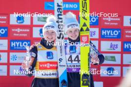 28.01.2024, Ljubno, Slovenia (SLO): Nika Prevc (SLO), Nika Kriznar (SLO), (l-r)  - FIS world cup ski jumping women, individual HS94, Ljubno (SLO). www.nordicfocus.com. © Barbieri/NordicFocus. Every downloaded picture is fee-liable.