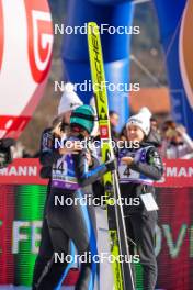 28.01.2024, Ljubno, Slovenia (SLO): Nika Kriznar (SLO), Ziva Andric (SLO), (l-r)  - FIS world cup ski jumping women, individual HS94, Ljubno (SLO). www.nordicfocus.com. © Barbieri/NordicFocus. Every downloaded picture is fee-liable.