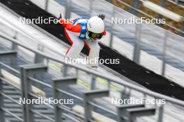 24.02.2024, Hinzenbach, Austria (AUT): Liangyao Wang (CHN) - FIS world cup ski jumping women, individual HS90, Hinzenbach (AUT). www.nordicfocus.com. © Volk/NordicFocus. Every downloaded picture is fee-liable.