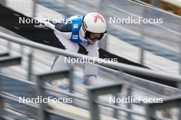 24.02.2024, Hinzenbach, Austria (AUT): Qingyue Peng (CHN) - FIS world cup ski jumping women, individual HS90, Hinzenbach (AUT). www.nordicfocus.com. © Volk/NordicFocus. Every downloaded picture is fee-liable.