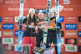 21.03.2024, Planica, Slovenia (SLO): Alexandria Loutitt (CAN), Eva Pinkelnig (AUT), Nika Prevc (SLO), (l-r) - FIS world cup ski flying women, individual HS102, Planica (SLO). www.nordicfocus.com. © Reichert/NordicFocus. Every downloaded picture is fee-liable.
