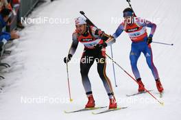 Biathlon - IBU World Cup Biathlon relay men 4x7.5km at Chiemgau-Arena - Ruhpolding (GER): Alexander Wolf (GER), Nikolay Kruglov (RUS).