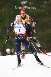 Biathlon - IBU world cup biathlon pursuit men 12.5 km, 10.03.2007 - Holmenkollen (NOR): Raphael Poiree (FRA), Michael Greis (GER).