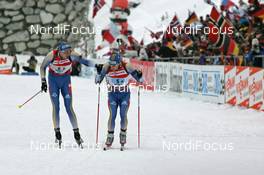 Biathlon - IBU Biathlon World Championchips 2007 mixed relay, 07.02.2007 - Antholz/Anterselva (ITA): Bjsrn Ferry (SWE) changes onto Carl Johann Bergman (SWE)