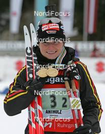 Biathlon - IBU Biathlon World Championchips 2007 relay women 4x6 km, 11.02.2007 - Antholz/Anterselva (ITA): Andrea Henkel (GER) with her two gold medals