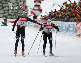 Biathlon - IBU Biathlon World Championchips 2007 mixed relay, 07.02.2007 - Antholz/Anterselva (ITA): Vincent Defrasne (FRA) changes onto Raphael Poiree (FRA)