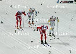 Ski Jumping - FIS Nordic World Ski Championchips - Cross Country Sprint - Sapporo (JPN) - 22.02.07: Final fight, left to right: Eldar Roenning (NOR), Bjoern Lind (SWE), Jens Arne Svartedal (NOR), Mats Larsson (SWE)
