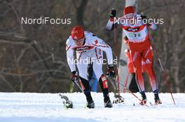 Cross-Country - FIS Nordic World Ski Championchips cross-country, relay men 4x10 km, 02.03.07 - Sapporo (JPN): George Grey (CAN), Toni Livers (SUI).