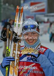 FIS Nordic World Ski Championchips - Cross Country 30 km C Mass start women - Sapporo (JPN) - 03.03.07: Virpi Kuitunen (FIN) with all her medals