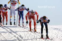 Cross-Country - FIS Nordic World Ski Championchips cross-country, relay men 4x10 km, 02.03.07 - Sapporo (JPN): Ville Nousiainen (FIN), Eldar Roenning (NOR), Nikolai Pankratov (RUS).