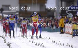 Cross-Country - FIS World Cup Cross Country  - Tour de Ski - 30 km men - Massstart - Classic Technique - Val di Fiemme (ITA) - Jan 6, 2007: Sprint in the finish, in front Eldar Roenning (NOR), behind him Sami Jauhojaervi (FIN) and Ivan Alypov (RUS)