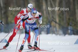 Cross-Country - FIS Nordic World Ski Championchips cross-country, relay men 4x10km, 02.03.07  - Sapporo (JPN): Alexander Legkov (RUS), Lars Berger (NOR) behind