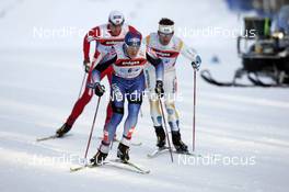 Cross-Country - FIS Nordic World Ski Championchips cross-country, relay men 4x10km, 02.03.07  - Sapporo (JPN): Evgenji Dementiev (RUS) ahead, Anders Soedergren (SWE) ri, Petter Northug (NOR) le