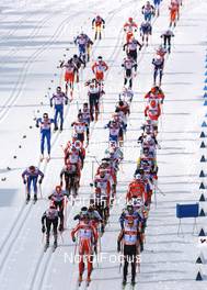 Cross-Country - FIS Nordic World Ski Championchips cross-country, mens 50 km classical mass start, 04.03.07 - Sapporo (JPN): Odd-Bjoern Hjelmeset (NOR) and Jens Filbrich (GER) leading the field.
