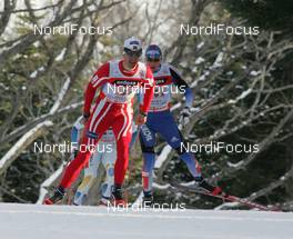 FIS Nordic World Ski Championchips - Cross Country Relay Men 4x10 km  - Sapporo (JPN) - 02.03.07: Lars Berger (NOR), behind Alexander Legkov (RUS)