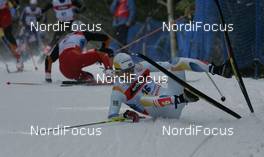 FIS Nordic World Ski Championchips - Cross Country 50 km C Mass start men - Sapporo (JPN) - 04.03.07: Crash Martin Larsson (SWE), behind Juergen Pinter (AUT) 