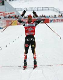 Ski Jumping - FIS Nordic World Ski Championchips - Nordic Combined Individual 15 km - Sapporo (JPN) - 03.03.07: Winner Ronny Ackermann (GER) on the finish line