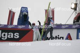 Ski Jumping - FIS Four hills tournament individual large hill HS 130 - Innsbruck (AUT): Anders Jacobsen NOR left, Thomas Morgenstern AUT right
