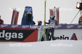 Ski Jumping - FIS Four hills tournament individual large hill HS 130 - Innsbruck (AUT): Anders Jacobsen NOR left, Thomas Morgenstern AUT right