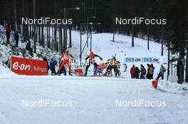 02.12.2007, Kontiolahti, Finland (FIN): l-r: Tora Berger (NOR), Kati Wilhelm (GER), Martina Glagow (GER) - IBU world cup biathlon, pursuit women, Kontiolahti (FIN). www.nordicfocus.com. c Manzoni/NordicFocus. Every downloaded picture is fee-liable.