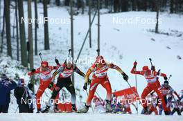 02.12.2007, Kontiolahti, Finland (FIN): Xianying Liu (CHN) leads a group - IBU world cup biathlon, pursuit women, Kontiolahti (FIN). www.nordicfocus.com. c Manzoni/NordicFocus. Every downloaded picture is fee-liable.