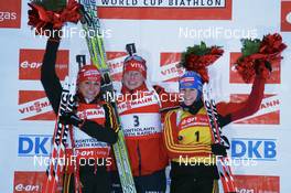 02.12.2007, Kontiolahti, Finland (FIN): l-r: Andrea Henkel (GER), Tora Berger (NOR), Martina Glagow (GER) - IBU world cup biathlon, pursuit women, Kontiolahti (FIN). www.nordicfocus.com. c Manzoni/NordicFocus. Every downloaded picture is fee-liable.