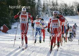 25.11.2007, Beitostoelen, Norway (NOR): Martin Sundby (NOR) right, Simen Oestensen (NOR) left  - FIS world cup cross-country, relay men, Beitostoelen. www.nordicfocus.com. c Furtner/NordicFocus. Every downloaded picture is fee-liable.