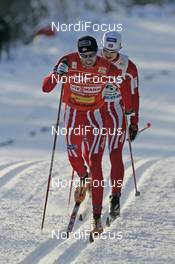 25.11.2007, Beitostoelen, Norway (NOR): Odd-Bjoern Hjelmeset (NOR), Jens Arne Svartedal (NOR) behind - FIS world cup cross-country, relay men, Beitostoelen. www.nordicfocus.com. c Furtner/NordicFocus. Every downloaded picture is fee-liable.