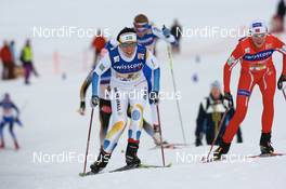 09.12.2007, Davos (SUI): Charlotte Kalla (SWE) and Kristin Stoermer Steira (NOR) - FIS World Cup cross-country, relay women - Davos (SUI). www.nordicfocus.com. c Manzoni/NordicFocus. Every downloaded picture is fee-liable.