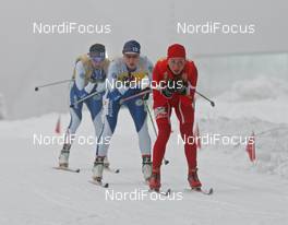 29.12.07, Nove Mesto, Czech Republic (CZE): in front Justyna Kowalczyk (POL), behind Aino Kaisa Saarinen (FIN), behind Virpi Kuitunen (FIN)  - FIS world cup cross-country, tour de ski, 10km women, Nove Mesto (CZE). www.nordicfocus.com. c Hemmersbach/NordicFocus. Every downloaded picture is fee-liable.