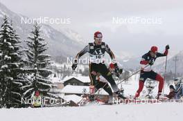 15.12.2007, Ramsau, Austria (AUT): l-r: Sebastian Haseney (GER), Johnny Spillane (USA) - FIS world cup nordic combined, mass start, Ramsau (AUT). www.nordicfocus.com. c Furtner/NordicFocus. Every downloaded picture is fee-liable.