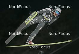 13.12.2007, Villach, Austria (AUT): Guido Landert (SUI) - FIS world cup ski jumping, individual HS98, Villach (AUT). www.nordicfocus.com. c Furtner/NordicFocus. Every downloaded picture is fee-liable.