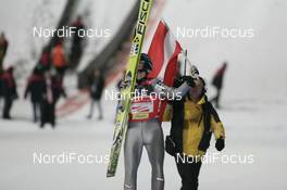 13.12.2007, Villach, Austria (AUT): Thomas Morgenstern (AUT) kissing his ski - FIS world cup ski jumping, individual HS98, Villach (AUT). www.nordicfocus.com. c Furtner/NordicFocus. Every downloaded picture is fee-liable.