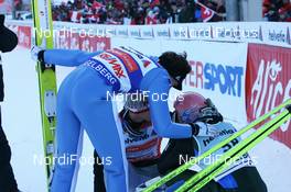 23.12.2007, Engelberg, Switzerland (SUI): l-r: Andreas Kuettel (SUI), Thomas Morgenstern (AUT) feel sorry for Andreas Kofler (AUT) - FIS world cup ski jumping, individual HS137, Engelberg (SUI). www.nordicfocus.com. c Manzoni/NordicFocus. Every downloaded picture is fee-liable.