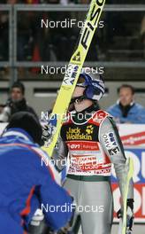 30.12.2007, Oberstdorf, Germany (GER): kissing the ski Thomas Morgenstern (AUT) - FIS world cup ski jumping, four hills tournament, individual HS137, Oberstdorf (GER). www.nordicfocus.com. c Furtner/NordicFocus. Every downloaded picture is fee-liable.