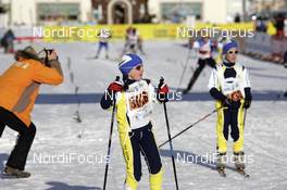 15.12.2007, Livigno, Italy (ITA): Children arriving at the finish - Worldloppet La Sgambeda, Minisgambeda, Kids Race,  Livigno (ITA). www.nordicfocus.com. c Felgenhauer/NordicFocus. Every downloaded picture is fee-liable.