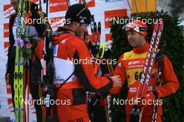 12.01.2008, Ruhpolding, Germany (GER): Simon Hallenbarter (SUI) and Ole Einar Bjoerndalen (NOR) - IBU world cup biathlon, sprint men, Ruhpolding (GER). www.nordicfocus.com. c Manzoni/NordicFocus. Every downloaded picture is fee-liable.