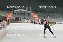 28.02.2008, Pyeong Chang, Korea (KOR): feature, last competitor heading to the finish, Pauline Macabies (FRA) - IBU World Cup biathlon, sprint women - Pyeong Chang (KOR). www.nordicfocus.com. c Hemmersbach/NordicFocus. Every downloaded picture is fee-liable.