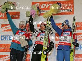 28.02.2008, Pyeong Chang, Korea (KOR): podium, l-r Sandrine Bailly (FRA), Magdalena Neuner (GER), Michaela Ponza (ITA) - IBU World Cup biathlon, sprint women - Pyeong Chang (KOR). www.nordicfocus.com. c Hemmersbach/NordicFocus. Every downloaded picture is fee-liable.