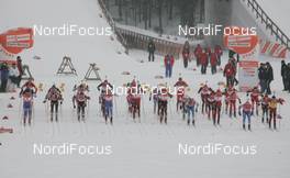 09.03.2008, Khanty Mansiysk, Russia (RUS): group, feature: start - IBU World Cup biathlon, mass men - Khanty Mansiysk (RUS). www.nordicfocus.com. c Hemmersbach/NordicFocus. Every downloaded picture is fee-liable.