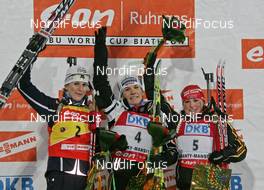 08.03.2008, Khanty Mansiysk, Russia (RUS): podium, l-r: Sandrine Bailly (FRA), Kathrin Hitzer (GER), Andrea Henkel (GER)   - IBU World Cup biathlon, pursuit women - Khanty Mansiysk (RUS). www.nordicfocus.com. c Hemmersbach/NordicFocus. Every downloaded picture is fee-liable.